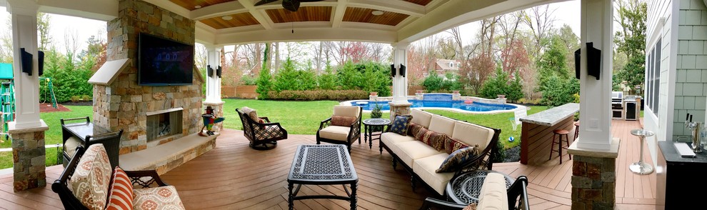 Inspiration for a large arts and crafts backyard patio in Philadelphia with a fire feature, decking and a gazebo/cabana.