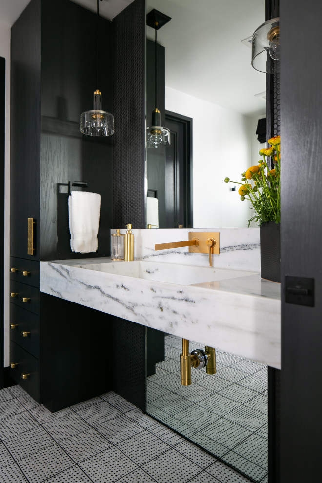 Design ideas for a contemporary bathroom in Orange County with flat-panel cabinets, black cabinets, an integrated sink, white floor and white benchtops.