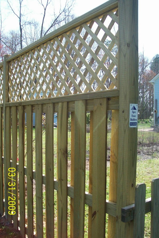 Inspiration for a rustic landscaping in Raleigh.