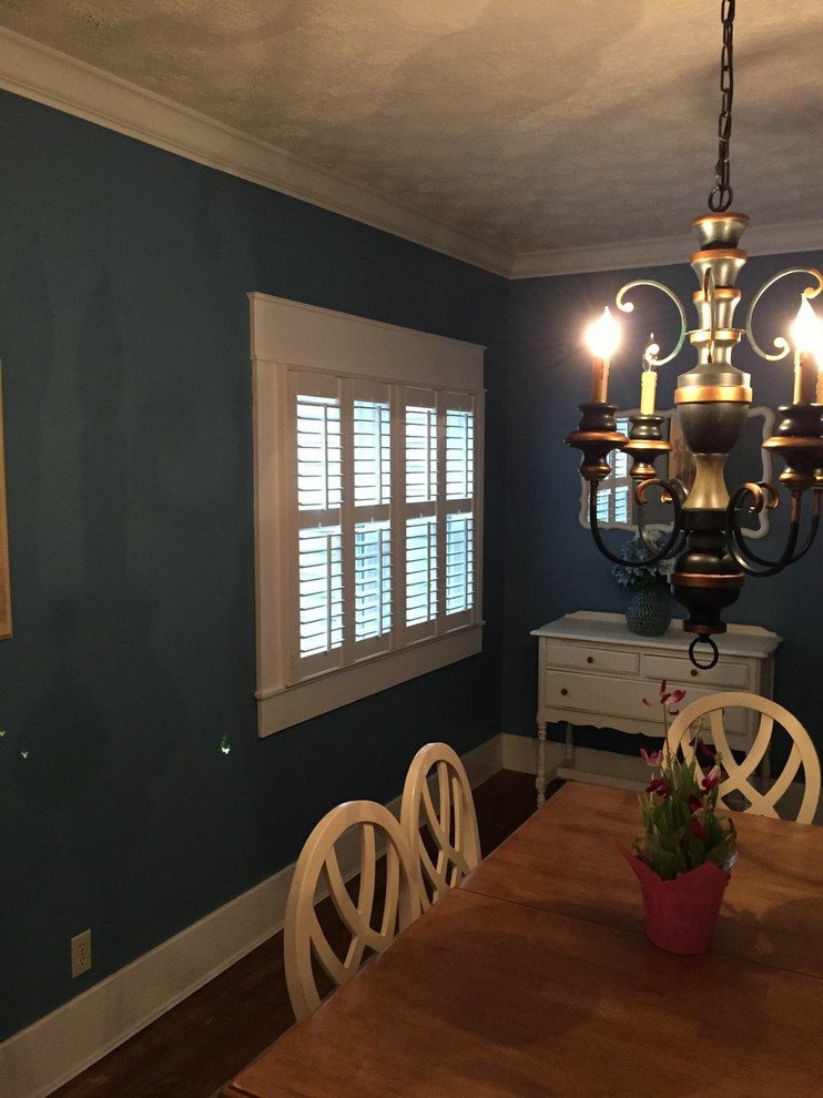 Enclosed dining room - small transitional medium tone wood floor enclosed dining room idea in Indianapolis with blue walls and no fireplace