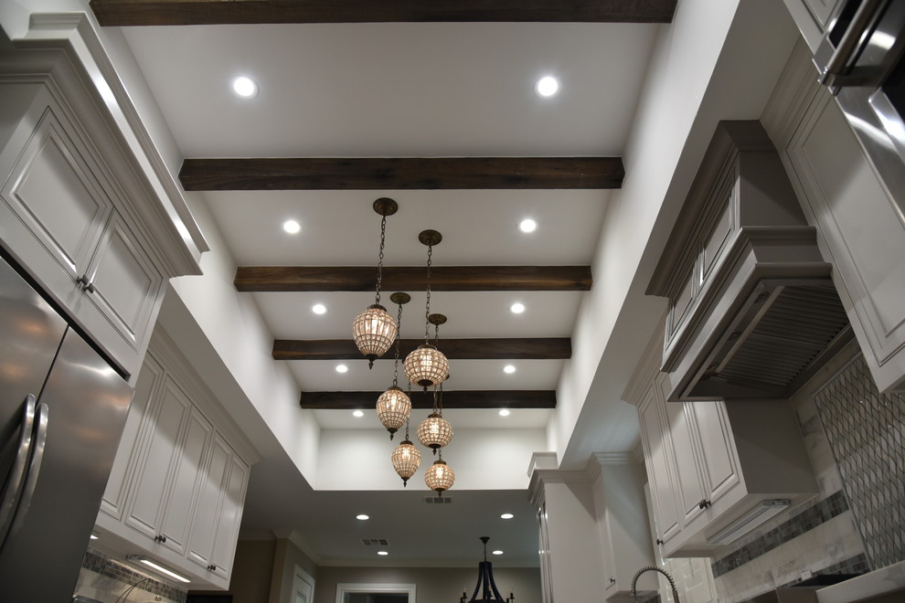 Example of a transitional kitchen design in Houston