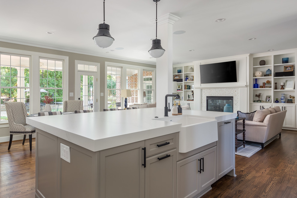 Inspiration for a transitional kitchen in Raleigh with red cabinets, quartz benchtops, with island and white benchtop.