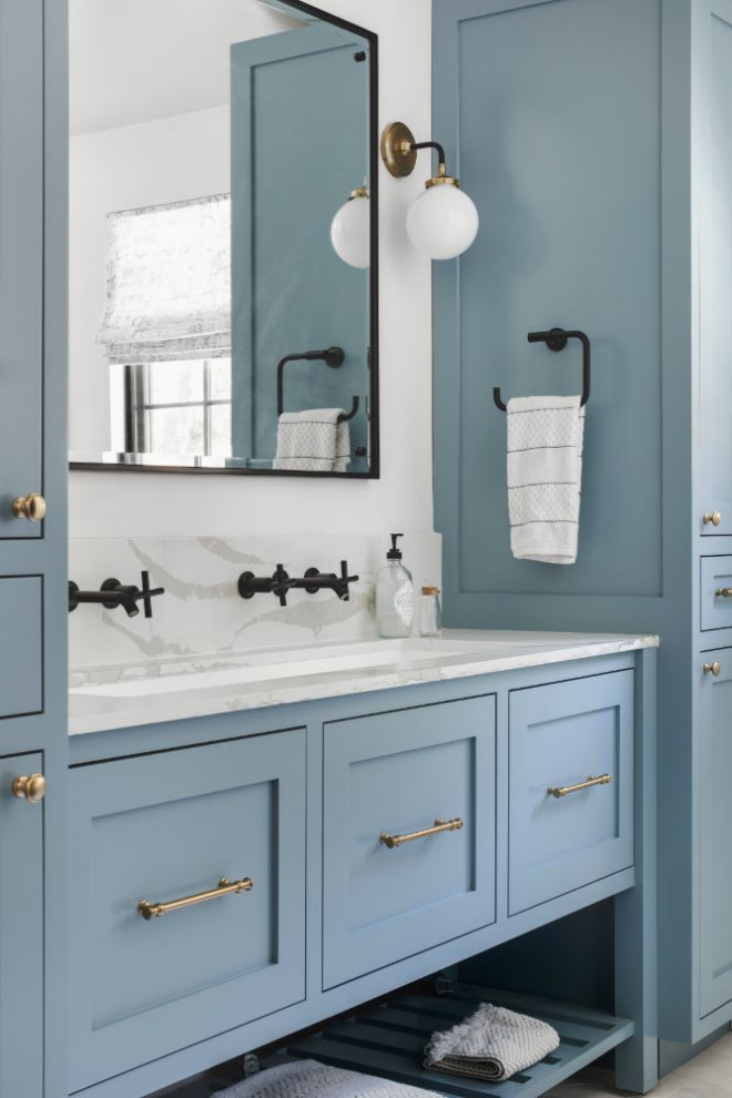 Design ideas for a medium sized classic ensuite wet room bathroom in Los Angeles with shaker cabinets, blue cabinets, a built-in bath, white walls, ceramic flooring, a submerged sink, marble worktops, white floors, a hinged door, white worktops, double sinks and a built in vanity unit.