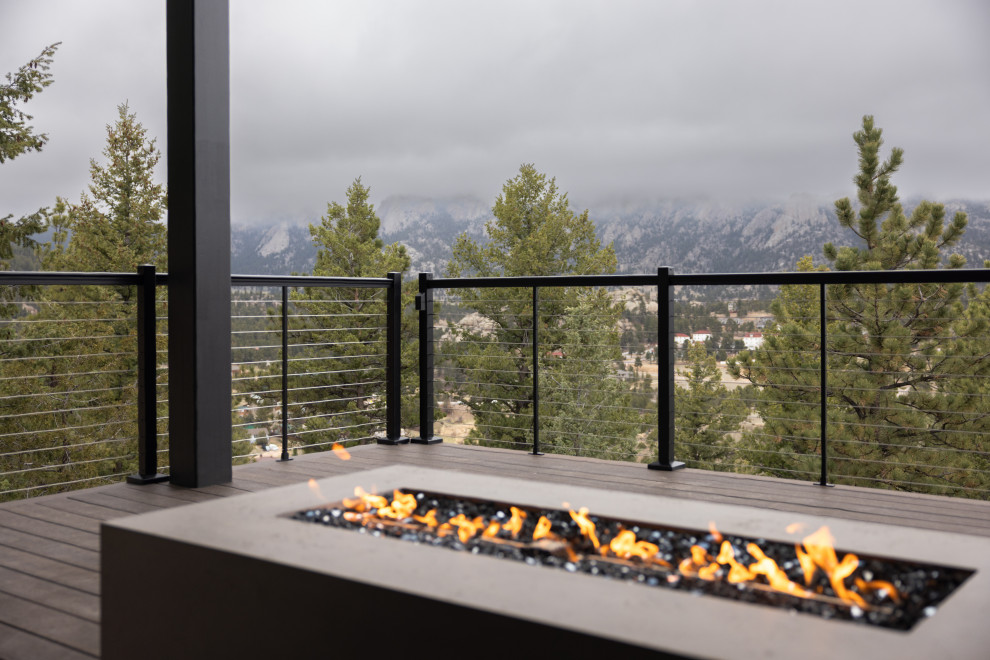 Deck - rustic deck idea in Denver