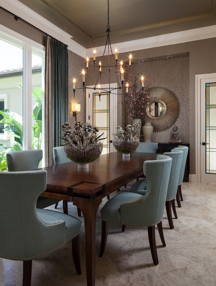 Design ideas for a transitional dining room in Miami with grey walls, beige floor and carpet.