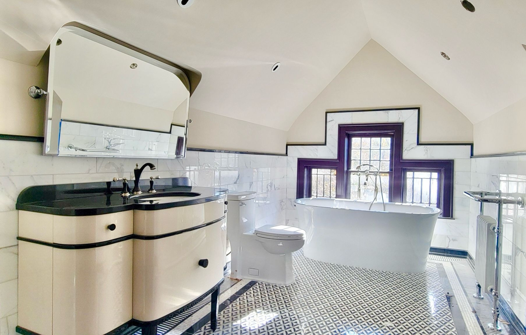 Above you see the before, here you see one part of the after for an luxury Attic Conversion and beautiful retro bathroom suite where the attic used to be.