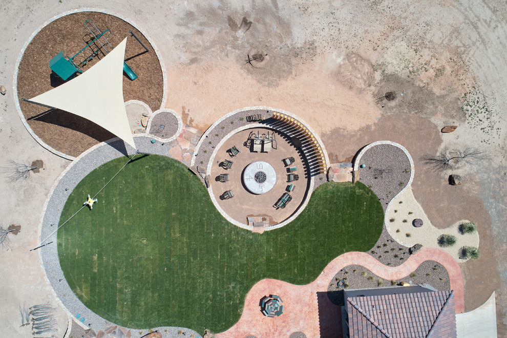 This is an example of a large rustic drought-tolerant and full sun backyard landscaping.