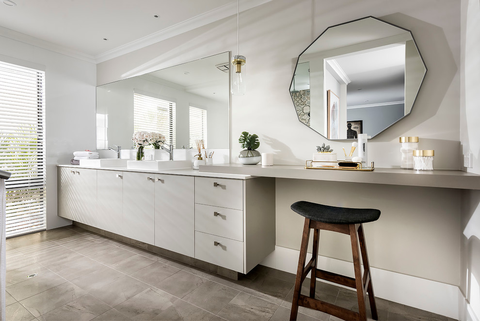 Inspiration for a contemporary bathroom in Perth with flat-panel cabinets, grey cabinets, grey walls, a vessel sink and grey benchtops.