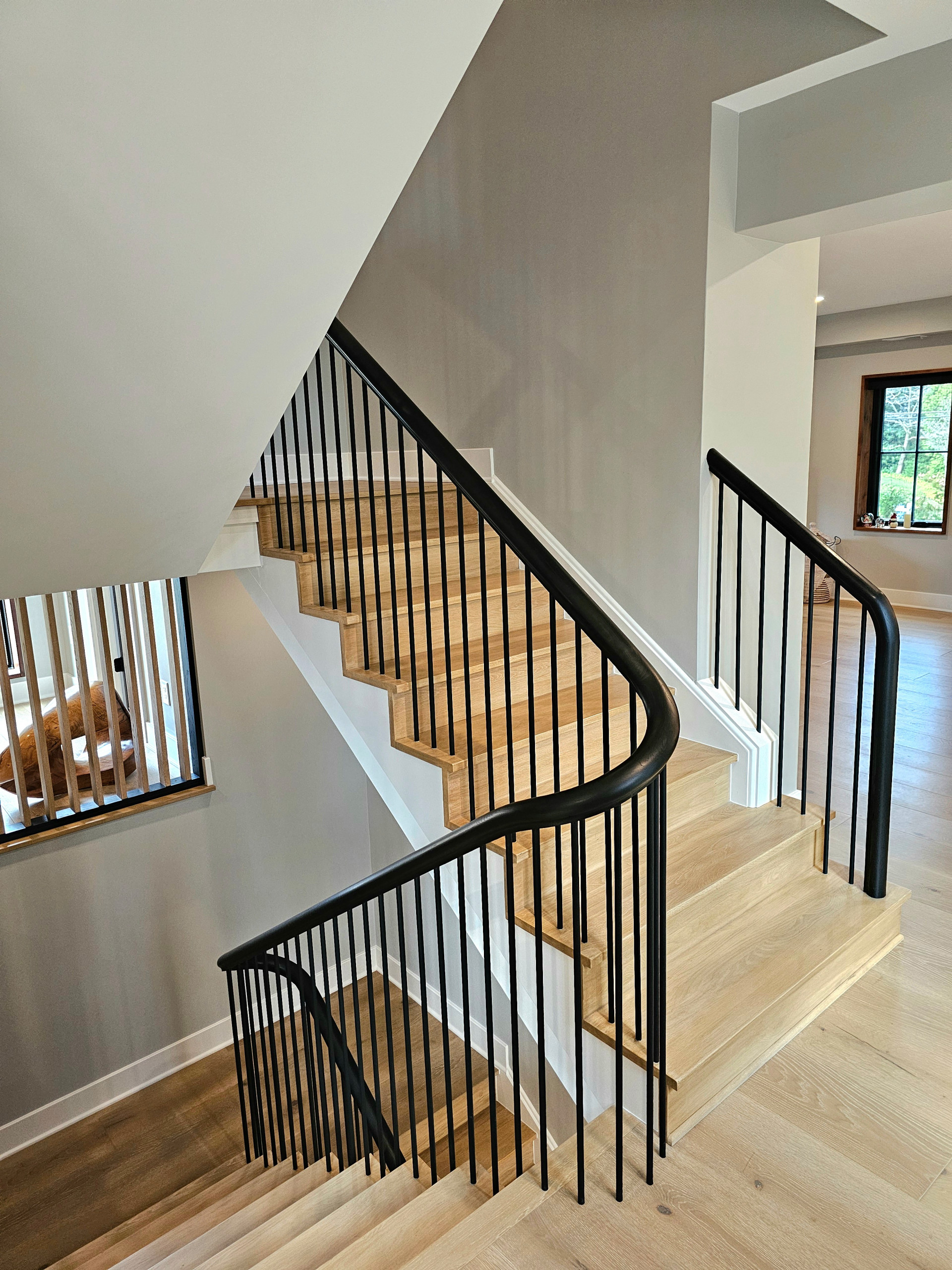 115_Stunning Continuous Rail System on 3 Story Floating Stairs; Arlington, VA 22