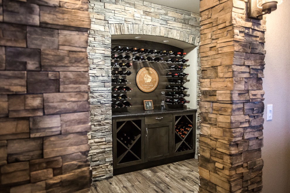 Design ideas for a mid-sized transitional wine cellar in Denver.