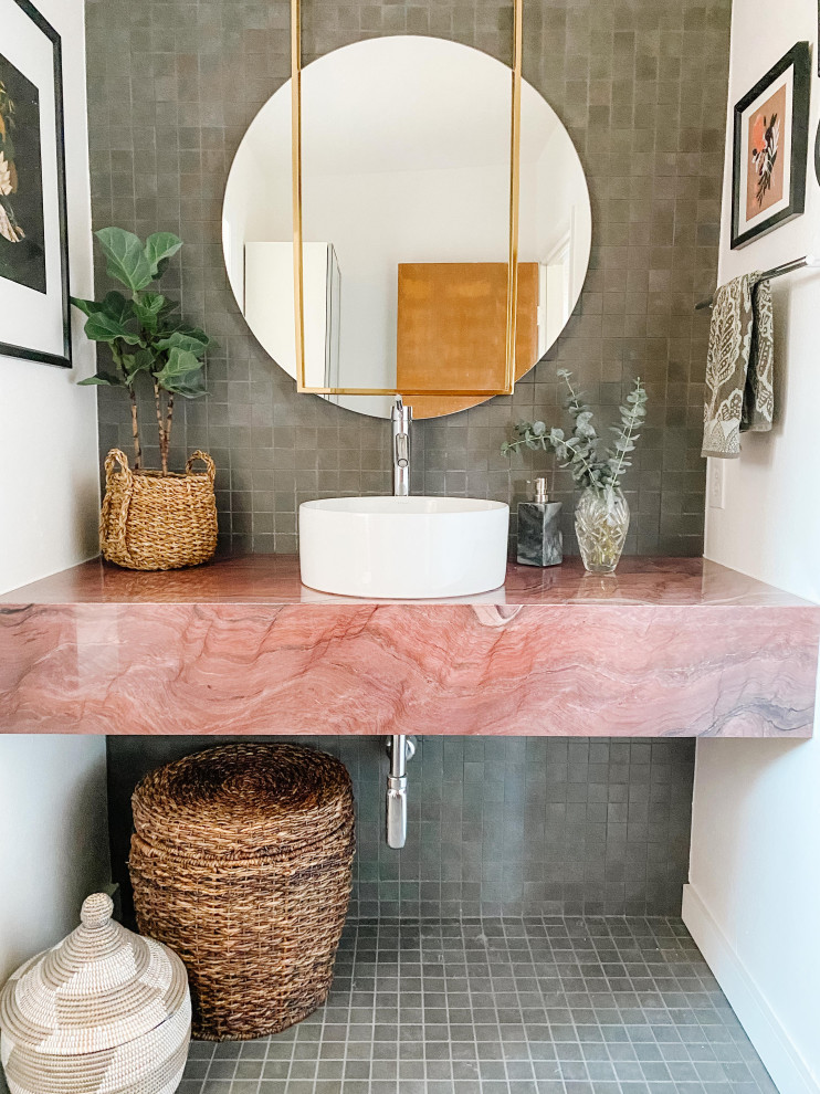 This is an example of a mid-sized midcentury kids bathroom in Denver with gray tile, porcelain tile, white walls, porcelain floors, a vessel sink, marble benchtops, grey floor, pink benchtops, a single vanity and a floating vanity.