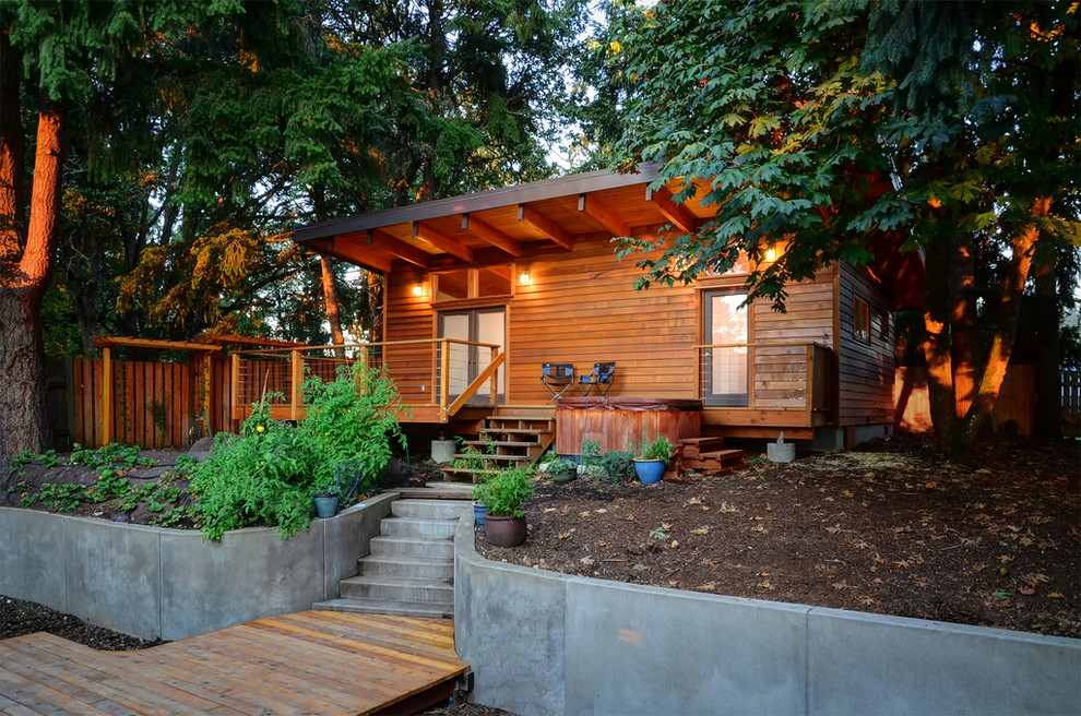 This is an example of a country one-storey exterior in San Francisco with wood siding.