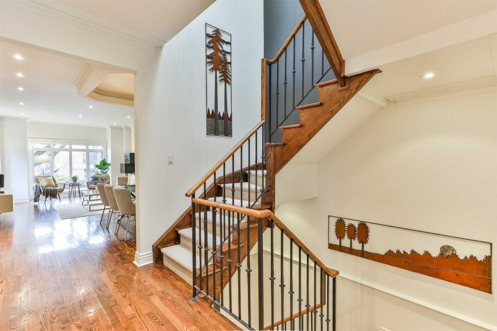 Transitional staircase photo in Toronto