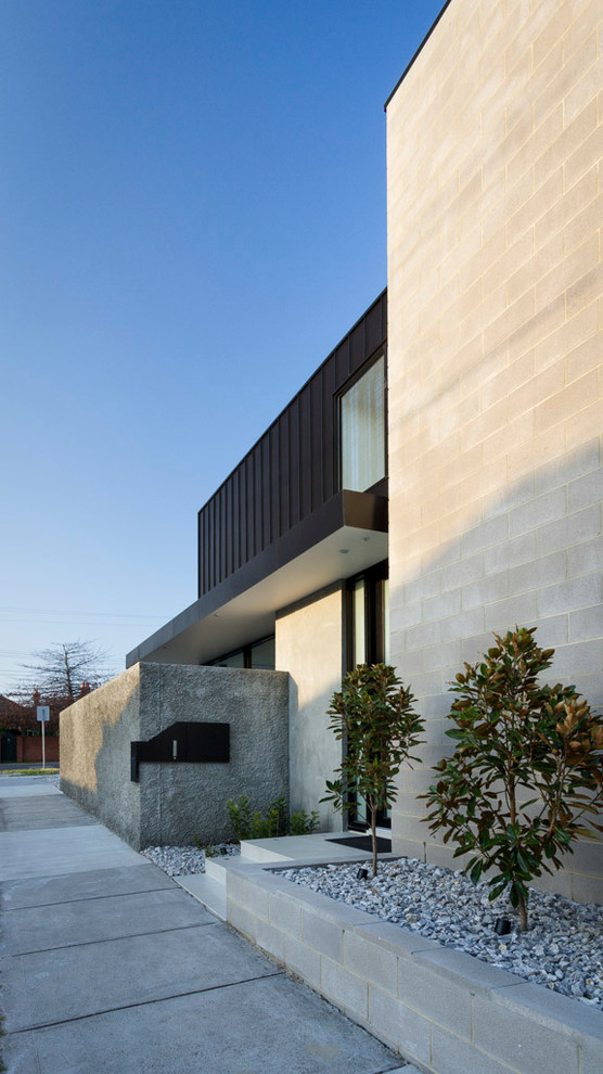 Mid-sized modern two-storey grey exterior in Melbourne.