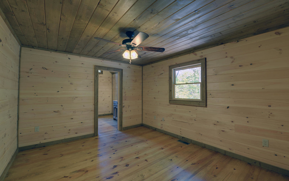 Example of a mountain style home design design in Atlanta