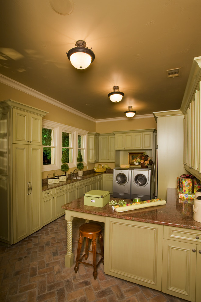 This is an example of a traditional laundry room in Austin.