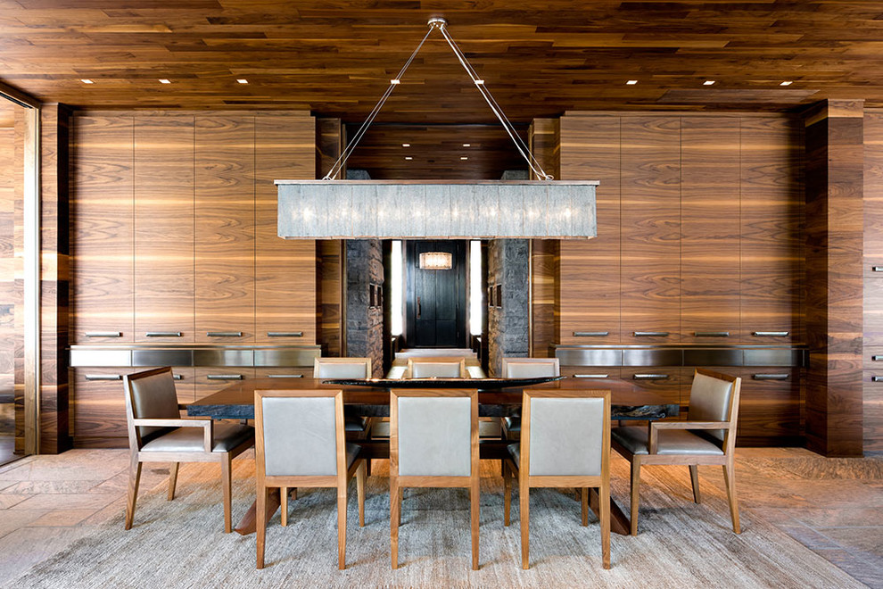 Inspiration for a large contemporary separate dining room in Other with brown walls, slate floors and no fireplace.