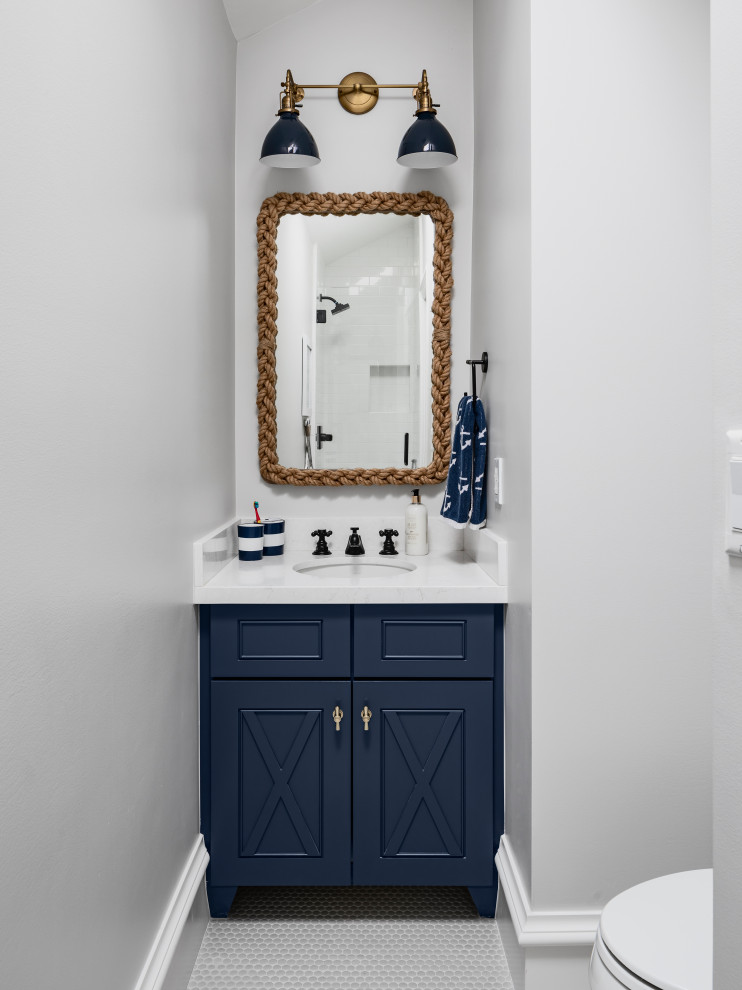 Inspiration for a small coastal 3/4 mosaic tile floor and gray floor bathroom remodel in Phoenix with blue cabinets, gray walls, an undermount sink, quartzite countertops, white countertops and recessed-panel cabinets