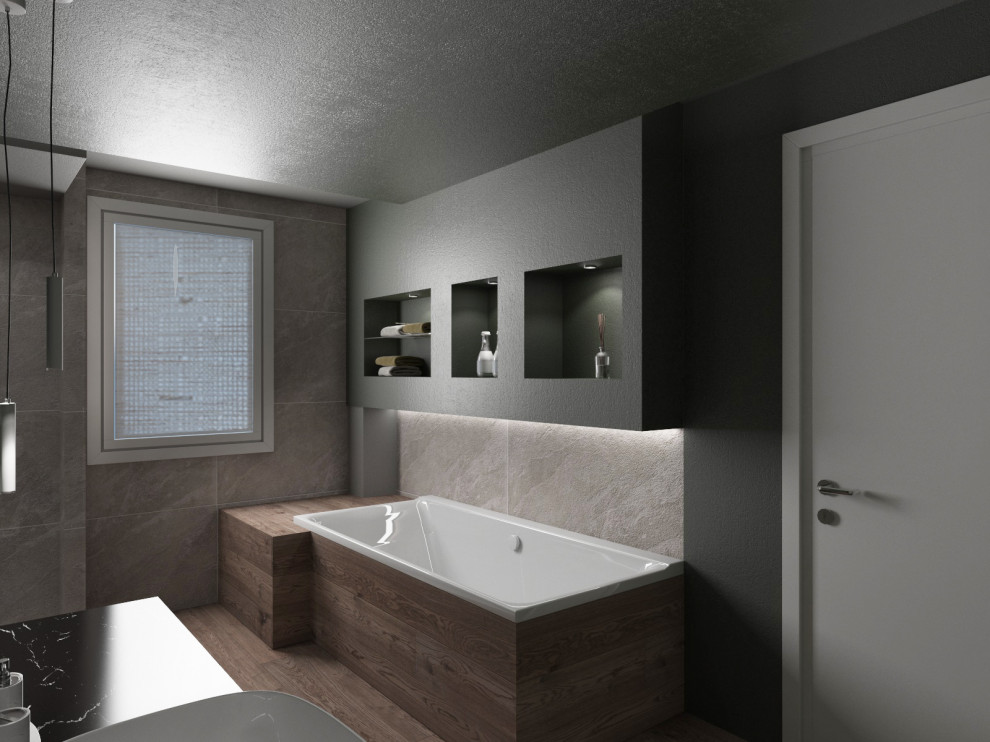 Photo of an expansive contemporary master bathroom in Venice with flat-panel cabinets, medium wood cabinets, a freestanding tub, an open shower, a two-piece toilet, gray tile, porcelain tile, wood-look tile, a vessel sink, marble benchtops, beige floor, an open shower, black benchtops, a niche, a single vanity, a floating vanity, recessed, wallpaper and green walls.