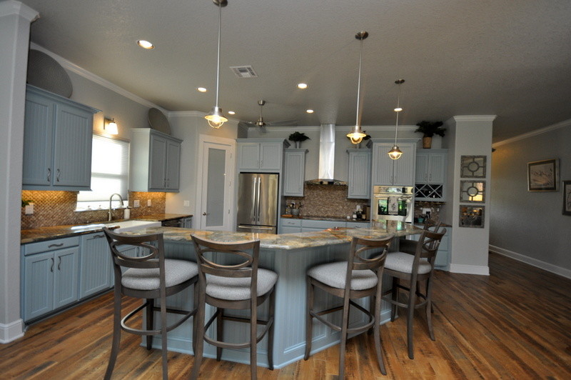 This is an example of a transitional kitchen in Portland.