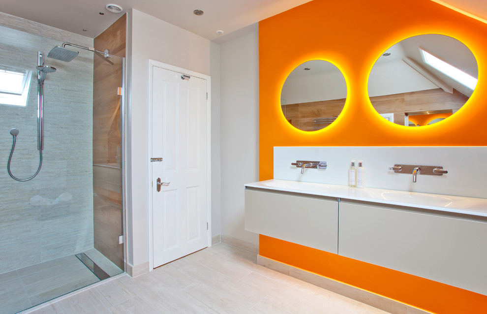 Large contemporary bathroom in Other with an open shower, a wall-mount toilet, beige tile, porcelain tile, orange walls and porcelain floors.