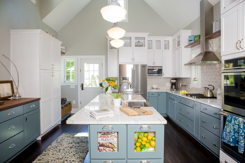 Inspiration for a large country galley open plan kitchen in Other with a farmhouse sink, shaker cabinets, blue cabinets, quartzite benchtops, ceramic splashback, stainless steel appliances, with island, brown floor, grey splashback and bamboo floors.