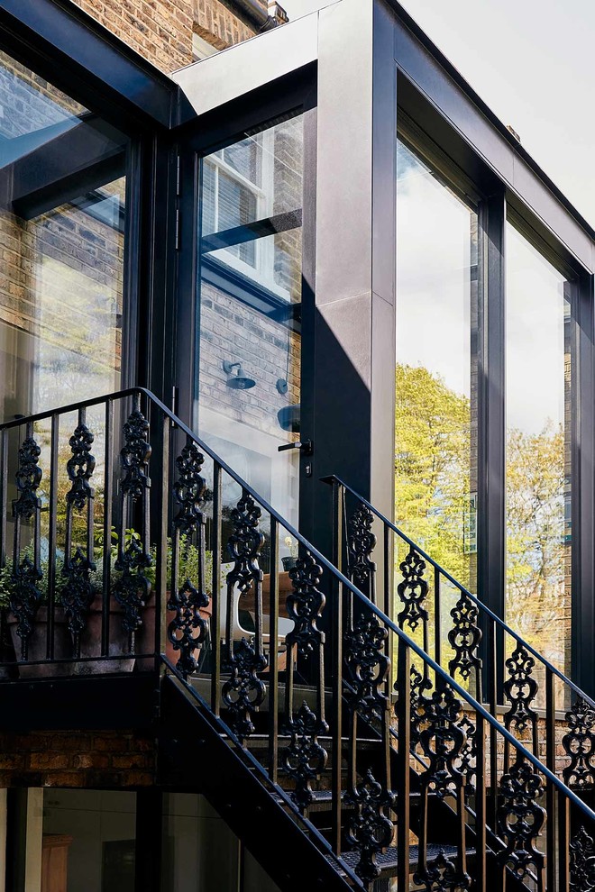This is an example of a contemporary metal railing balcony in Buckinghamshire.