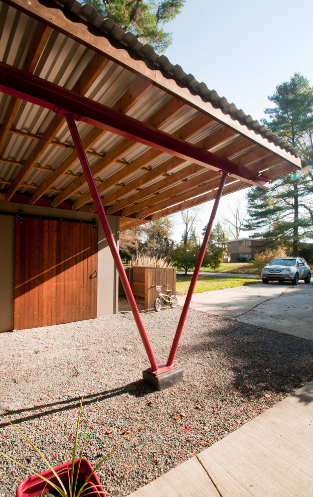 Inspiration for a mid-sized contemporary detached one-car carport in Philadelphia.