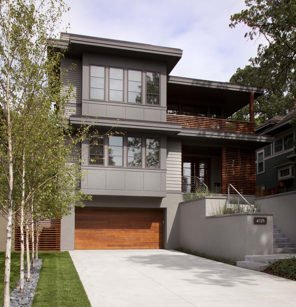 Inspiration for a contemporary two-storey exterior in Minneapolis.