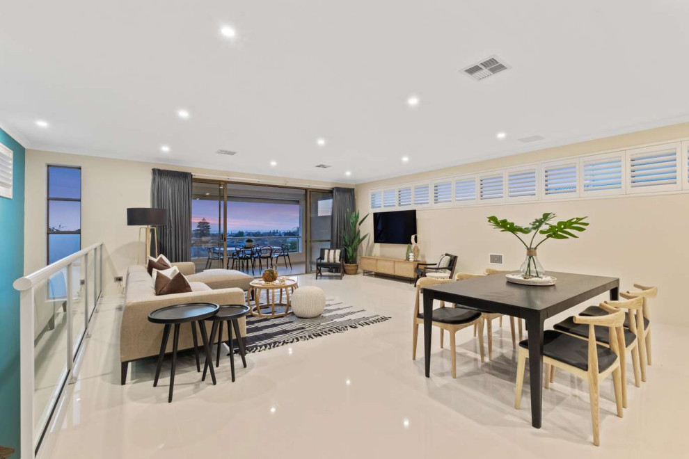 Photo of a beach style dining room in Perth.