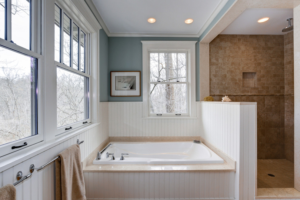 Design ideas for a mid-sized arts and crafts master bathroom in DC Metro with white cabinets, a drop-in tub, a corner shower, brown tile, ceramic tile, grey walls and an open shower.