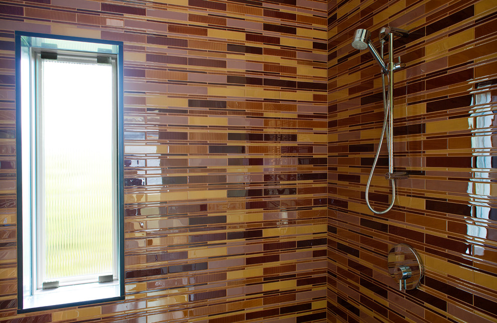 Photo of a mid-sized contemporary master bathroom in Toronto with a corner shower, multi-coloured tile, mosaic tile and multi-coloured walls.