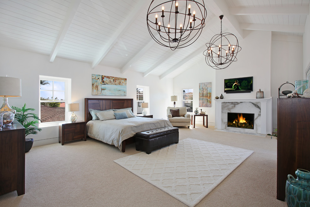 Inspiration for a transitional bedroom in Orange County with white walls.
