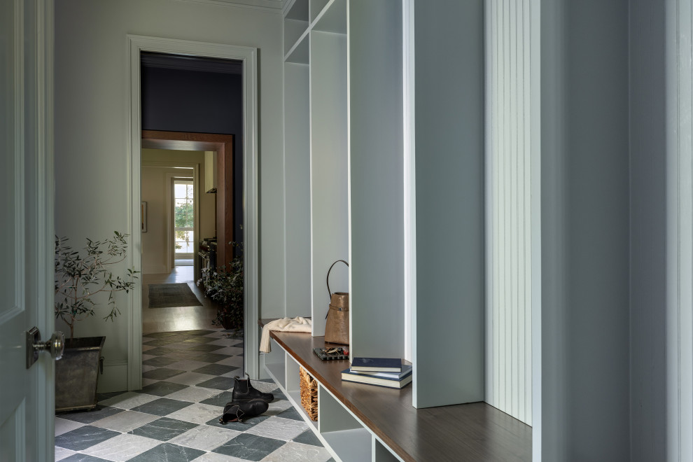Inspiration for a transitional multicolored floor mudroom remodel in DC Metro with gray walls