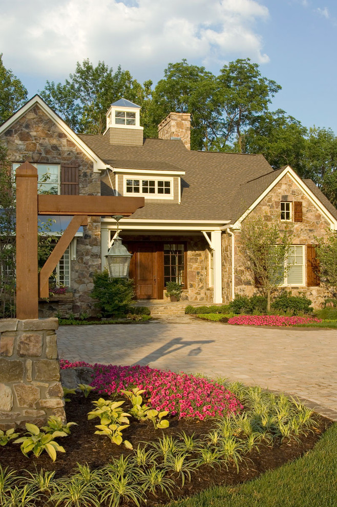Design ideas for a traditional exterior in Indianapolis with stone veneer.