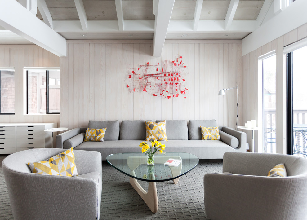 Inspiration for a scandinavian open concept living room in Sacramento with carpet and no tv.