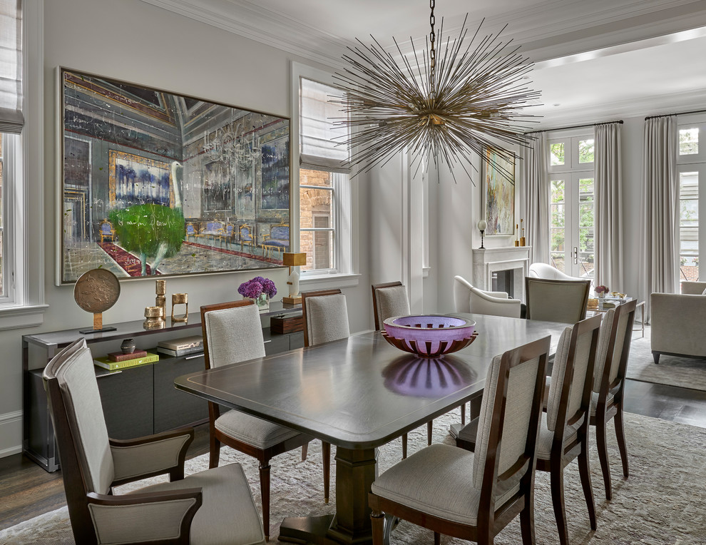 Inspiration for a transitional dining room in Chicago with grey walls, dark hardwood floors and brown floor.