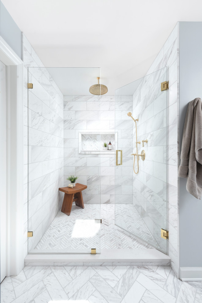 Freestanding bathtub - large transitional master white tile and marble tile marble floor, white floor, single-sink and vaulted ceiling freestanding bathtub idea in Chicago with shaker cabinets, blue cabinets, blue walls, an undermount sink, quartz countertops, a hinged shower door, white countertops, a niche and a built-in vanity