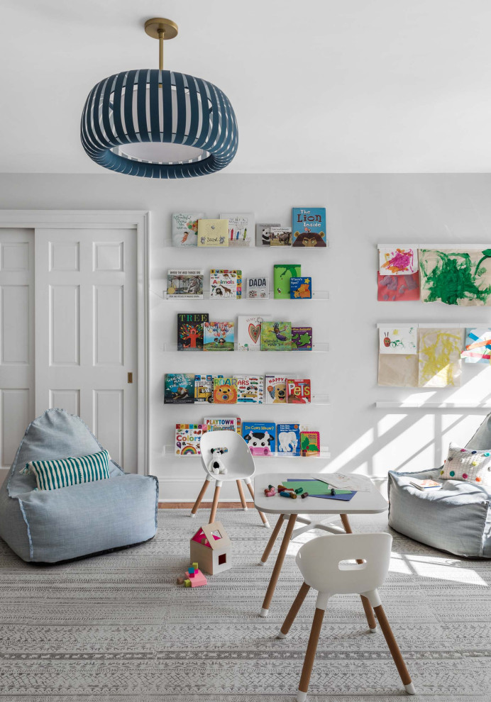 Photo of a beach style kids' room in New York.