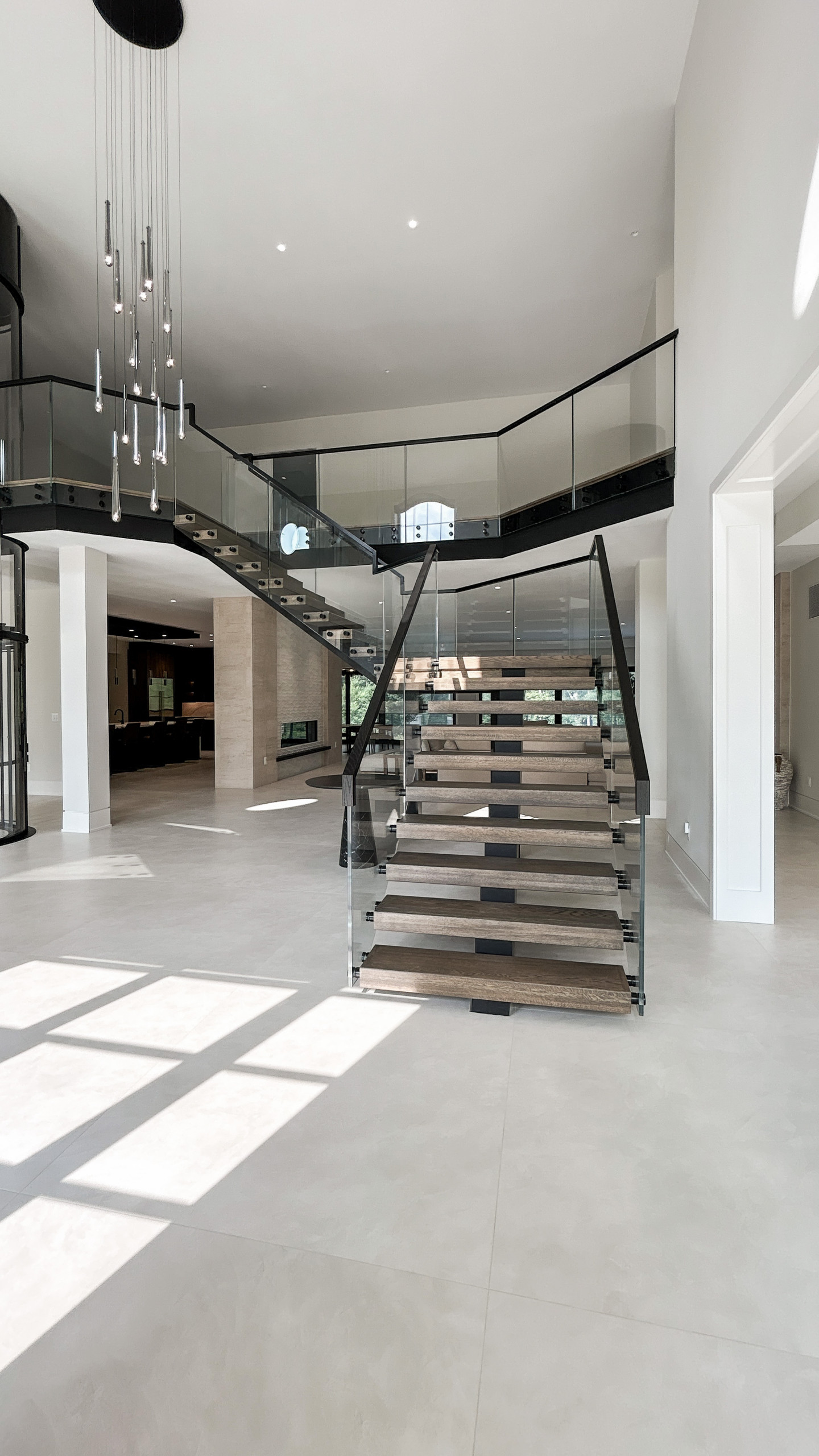 Project #159 | Modern Foyer Stair with Stand-off Glass Railing
