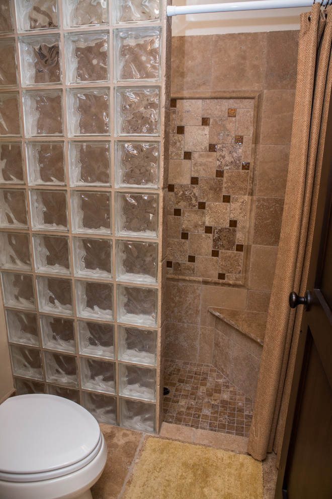 Example of a mid-sized transitional master beige tile and stone tile mosaic tile floor doorless shower design in Phoenix with beige walls