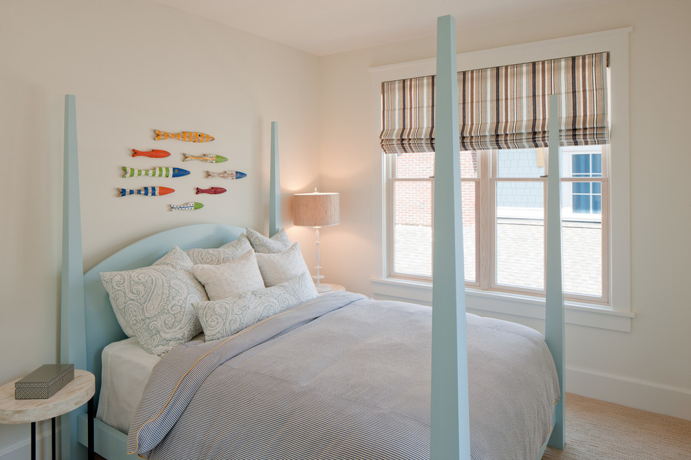 Inspiration for a beach style bedroom in Grand Rapids with beige walls and carpet.