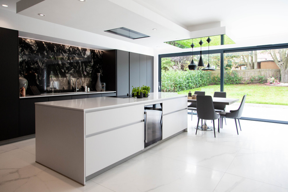 Inspiration for an expansive contemporary kitchen in London with with island.