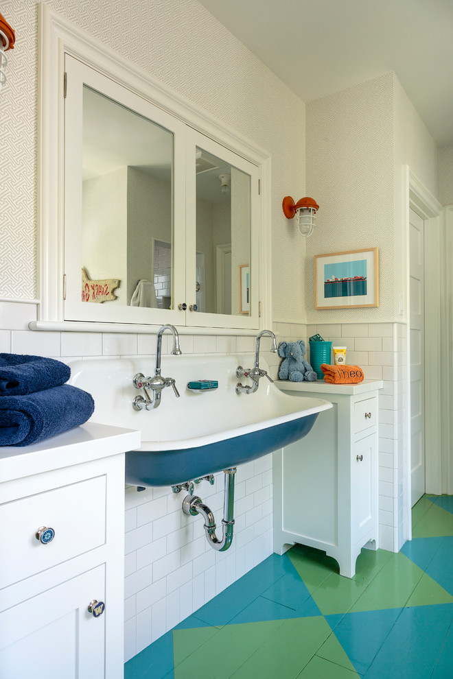 Design ideas for a country kids bathroom in Los Angeles with shaker cabinets, white cabinets, white tile, ceramic tile, engineered quartz benchtops, white benchtops, white walls, painted wood floors, a wall-mount sink and multi-coloured floor.