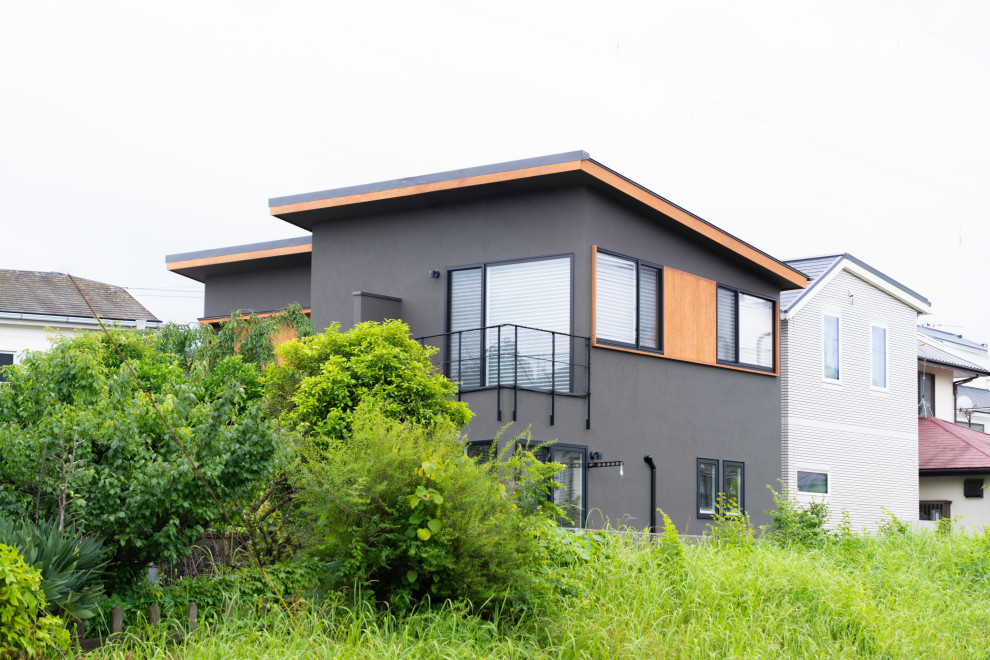 他の地域にあるおしゃれな家の外観の写真