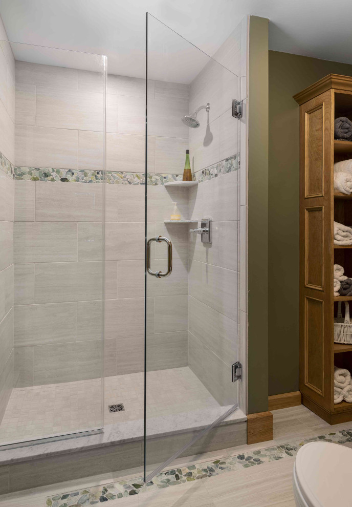 Photo of a small country 3/4 wet room bathroom in Burlington with furniture-like cabinets, black cabinets, orange tile, wood benchtops, a two-piece toilet, green walls, ceramic floors, an undermount sink, multi-coloured floor and a hinged shower door.