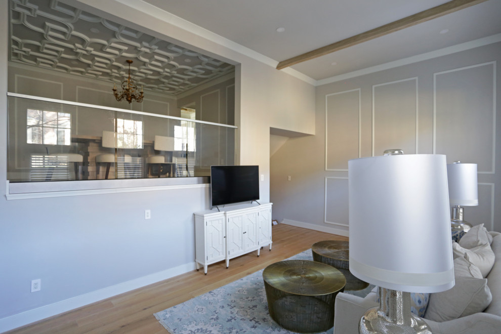 Inspiration for a mid-sized transitional l-shaped marble floor kitchen remodel in DC Metro with an undermount sink, shaker cabinets, white cabinets, quartzite countertops, white backsplash, quartz backsplash and stainless steel appliances
