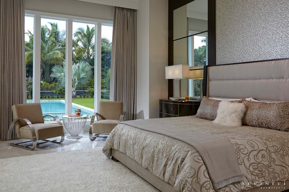Example of a transitional bedroom design in Miami