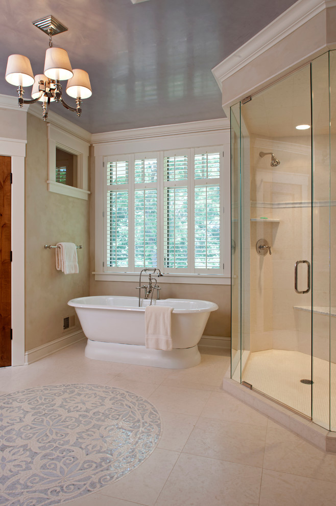 Photo of a traditional bathroom in Minneapolis with a freestanding tub and a corner shower.