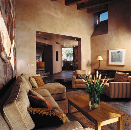 Design ideas for a small traditional formal enclosed living room in Albuquerque with beige walls and slate floors.